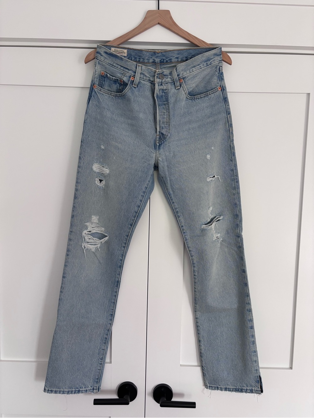 Levi’s 501 distressed light blue straight leg jeans, 28x32
